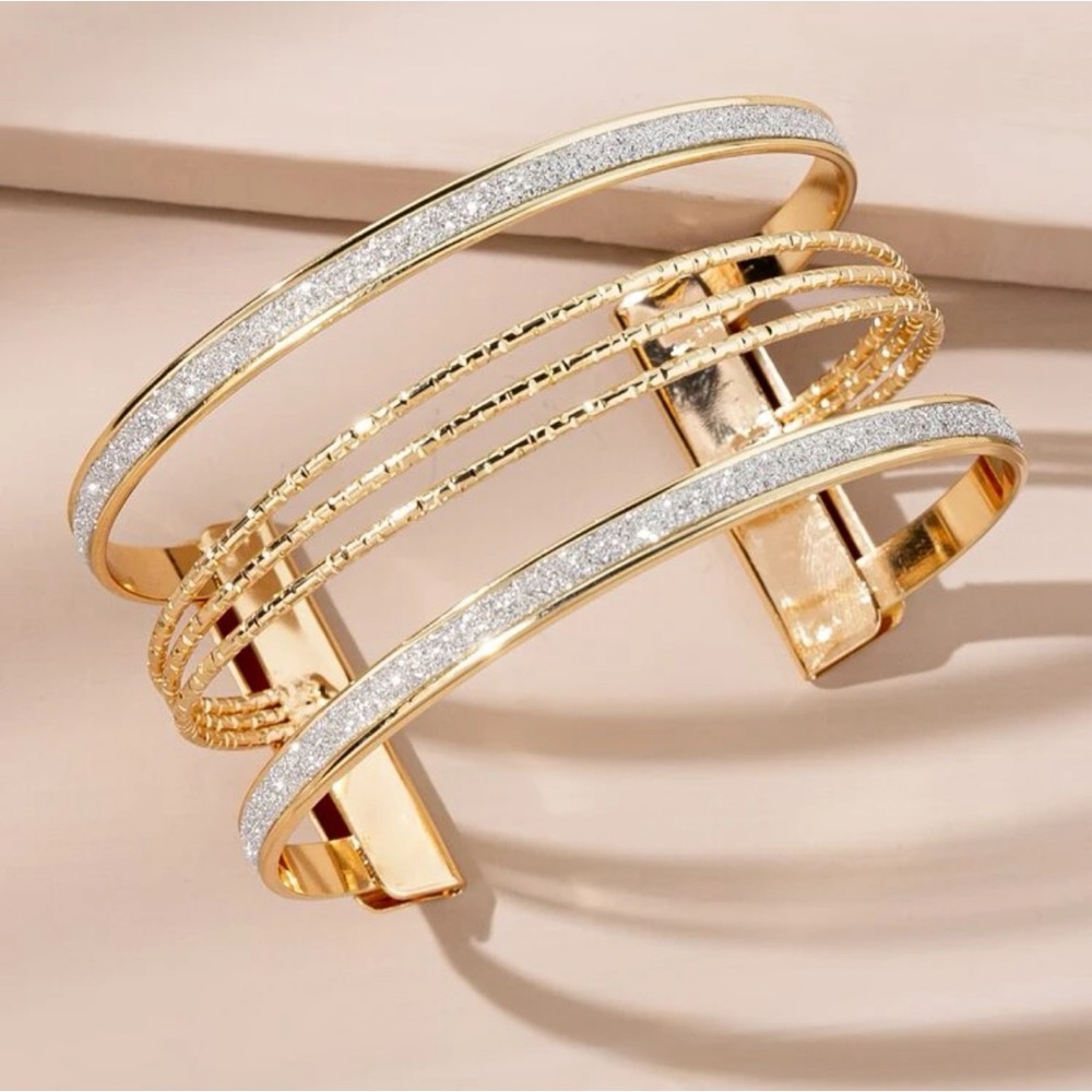 Gold and silver cuff bangle